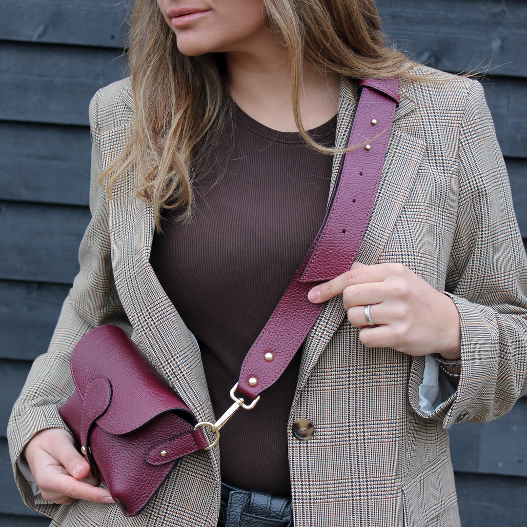 burgundy handbag with thick strap