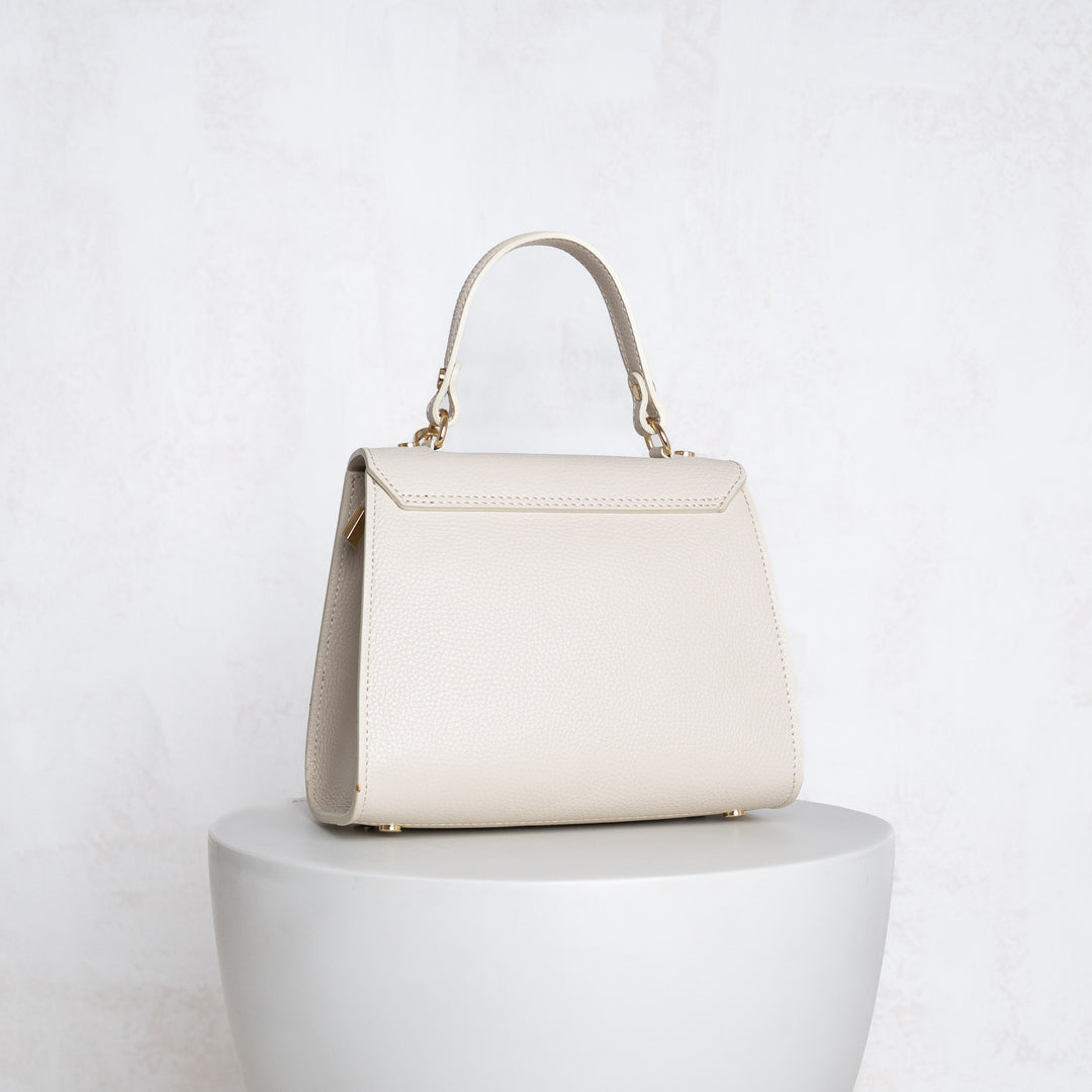 the back view of grace leather top handle bag 