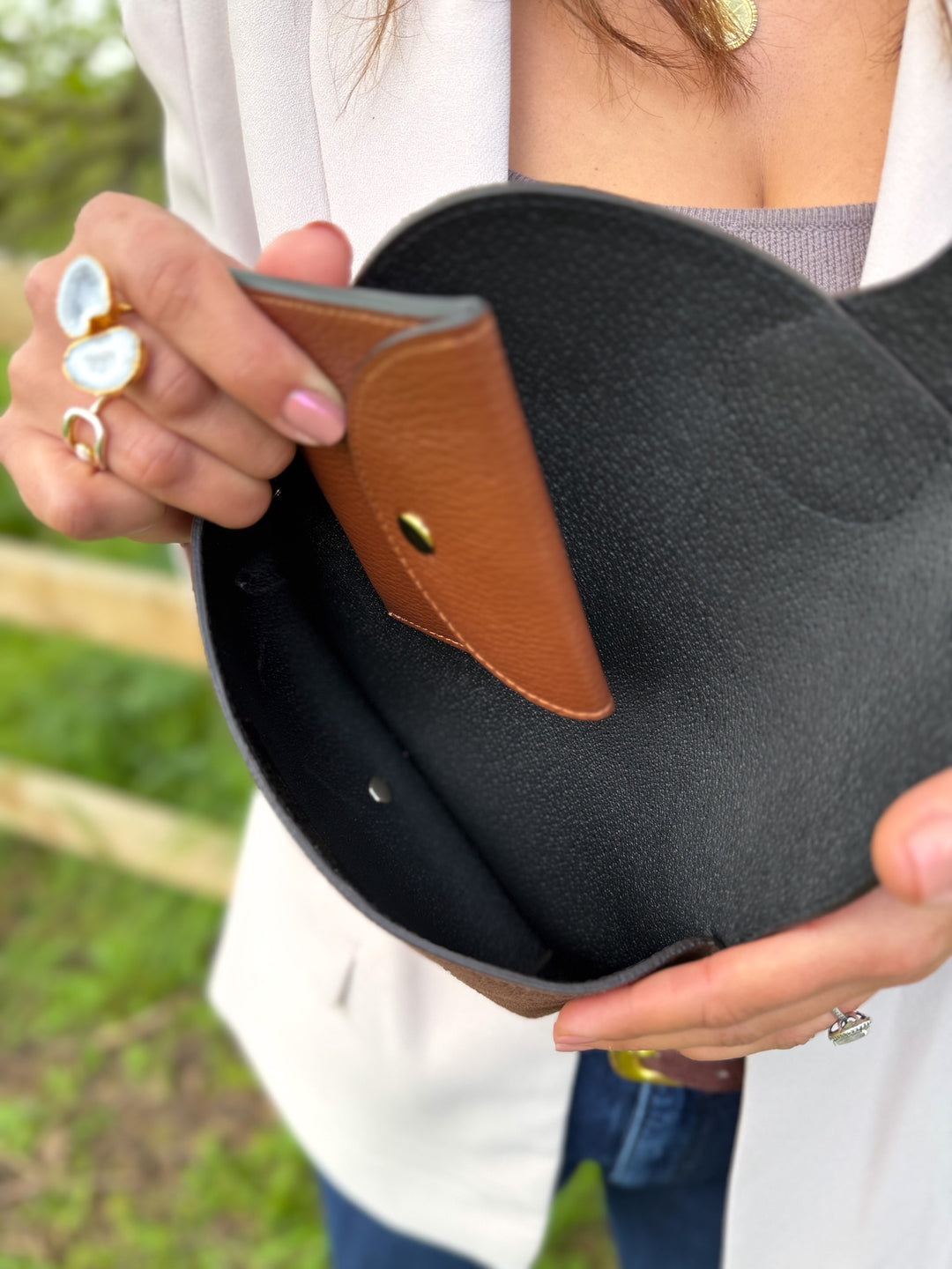 Inside Arabella suede crossbody bag showing space for phone, cards and essentials chestnut brown