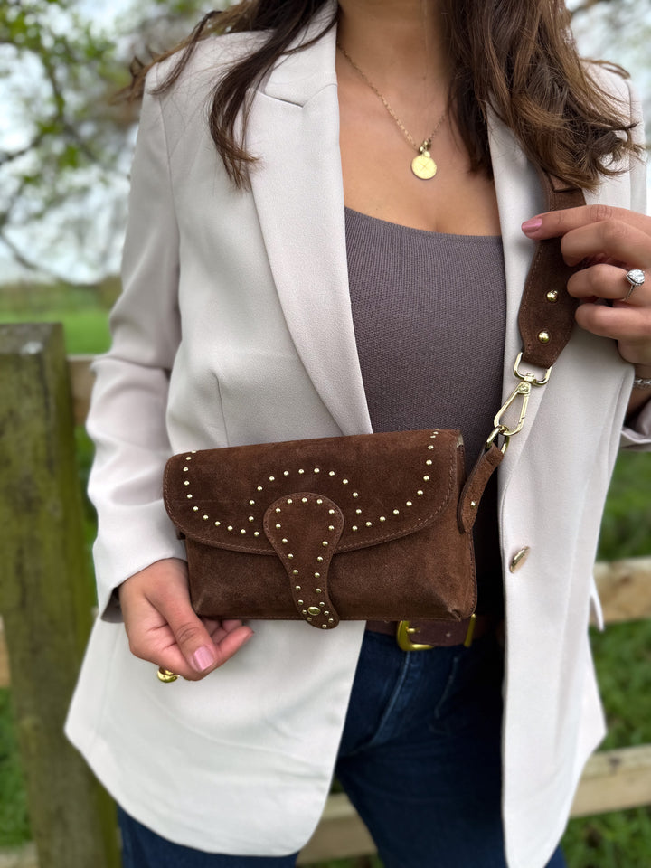 Arabella suede crossbody bag side view with statement gold stud detailing chestnut brown