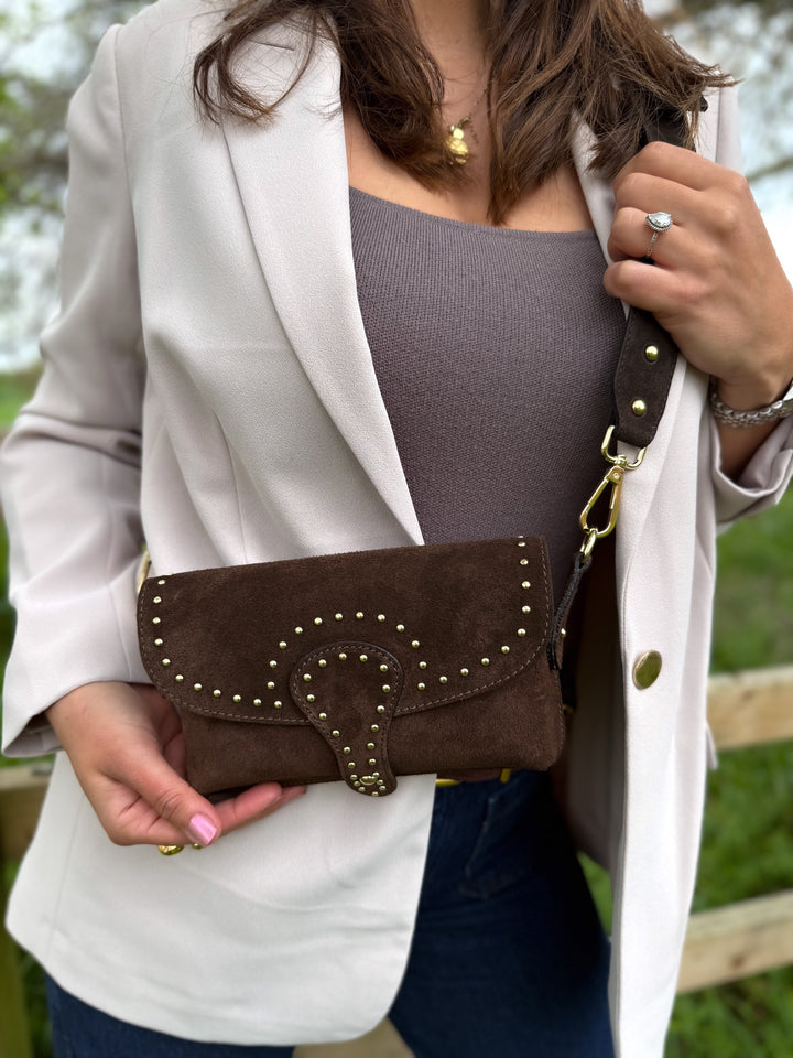Close-up of soft Italian suede leather and gold studs on Arabella crossbody bag dark brown 
