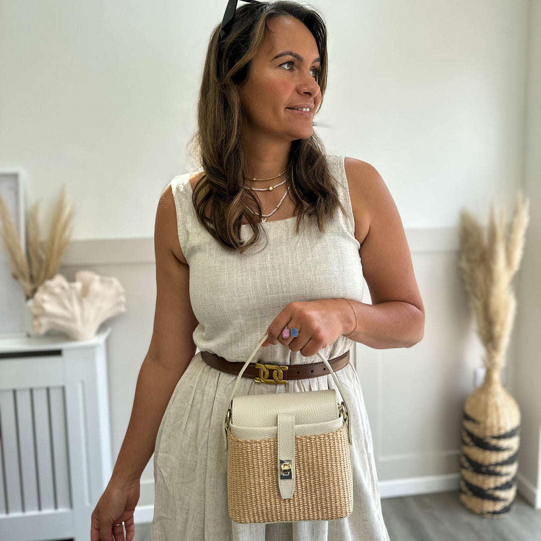 leather and raffia top handle bag